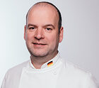 Portraitfoto von Christian Ibrügger